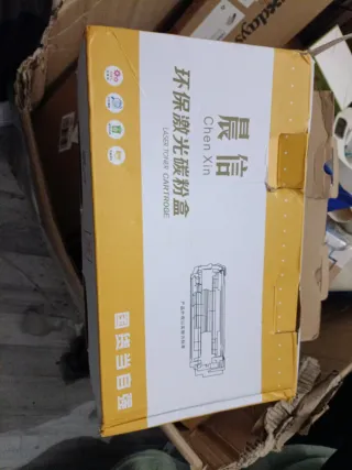 Tambor de impresora verde y negro