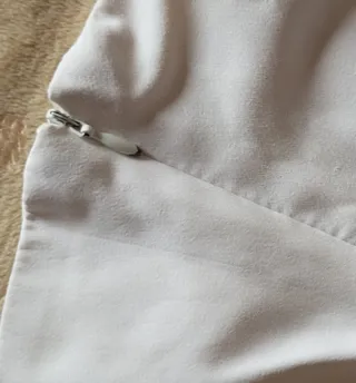 Top Zara Blanco con Anillas Marrones