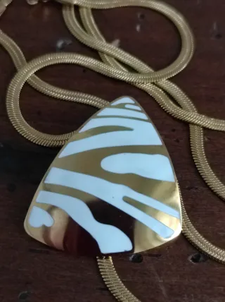 Doppia collana con pendente geometrico oro panna