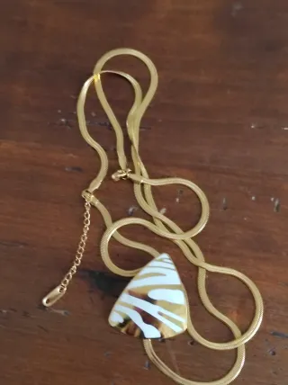 Doppia collana con pendente geometrico oro panna