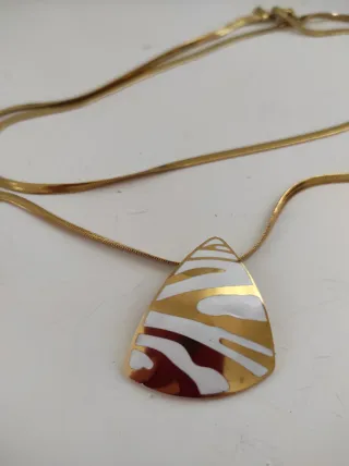 Doppia collana con pendente geometrico oro panna