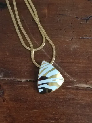 Doppia collana con pendente geometrico oro panna