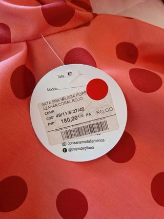 Traje de flamenca coral con lunares