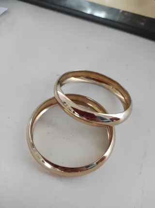 Set 2 bracciali rigidi bombati oro