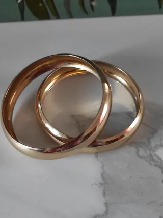 Set 2 bracciali rigidi bombati oro