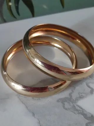 Set 2 bracciali rigidi bombati oro