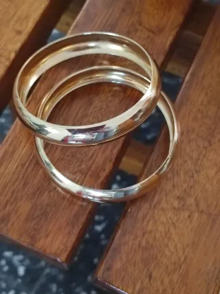 Set 2 bracciali rigidi bombati oro