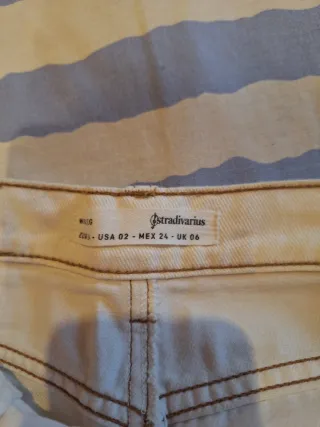 Pantalón vaquero ancho beige chica