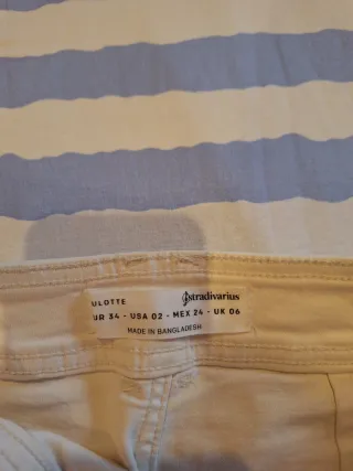 Pantalón vaquero ancho beige chica