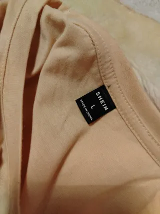 Camiseta beige con oso