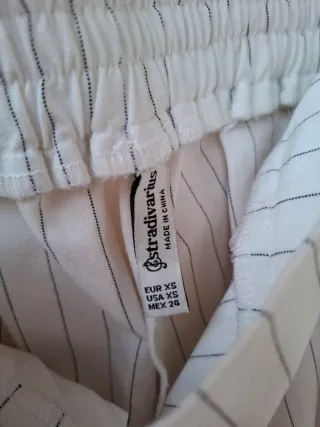Pantalón pinzas blanco de rayas