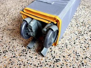 Cuna de viaje BBY color naranja y gris