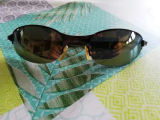 Gafas de sol Oakley gunmetal y dorado