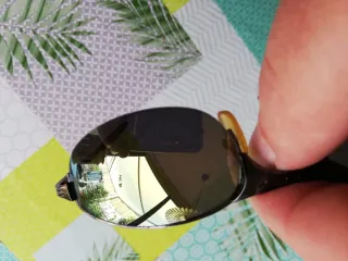 Gafas de sol Oakley gunmetal y dorado