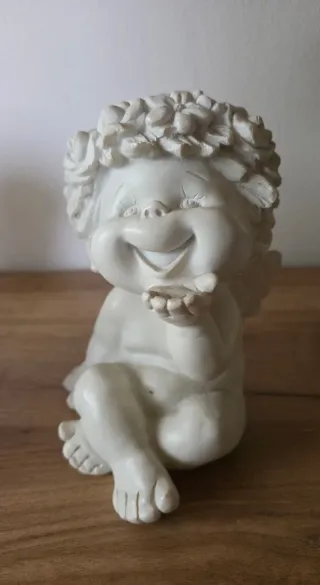 Coppia di puttini in resina