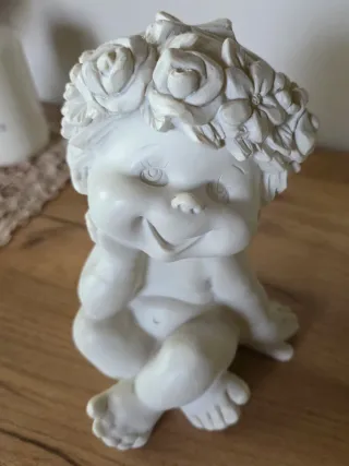 Coppia di puttini in resina