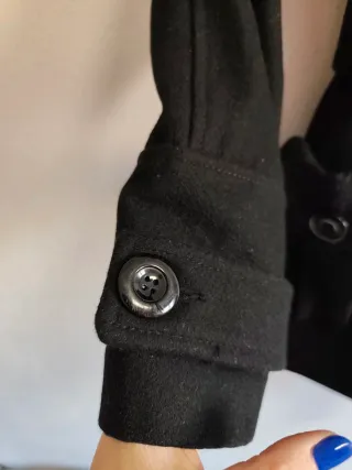 Abrigo corto de chica talla L de Blanco.