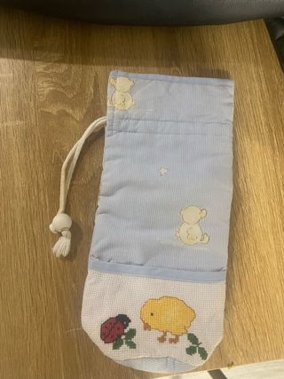 Porta biberones azul con ositos y pollito