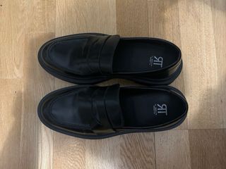 Mocasines de piel negros de  Roberto Torreta