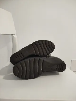 Botas negras de cuero con forro