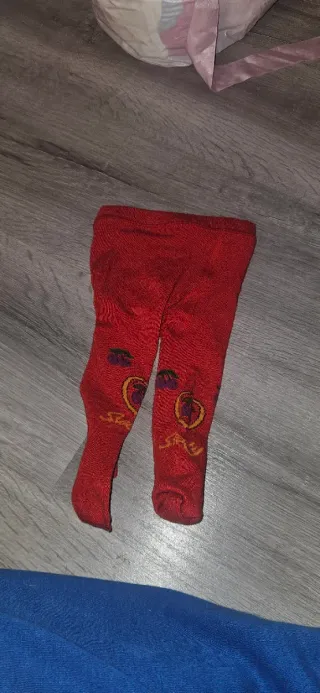 Ropa de bebe de juguete