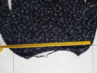 Abito Conbipel nero fantasia