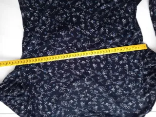 Abito Conbipel nero fantasia