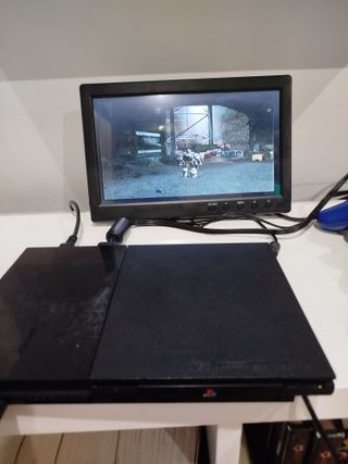 PlayStation 2 Slim + giochi