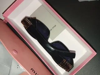 Gafas de sol Miu Miu negras