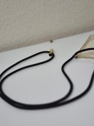 Funda móvil transparente con cordón