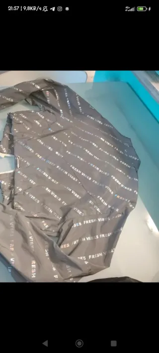 Chaqueta cortavientos reflectante gris