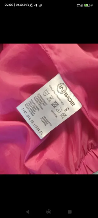 Cazadora cortavientos rosa