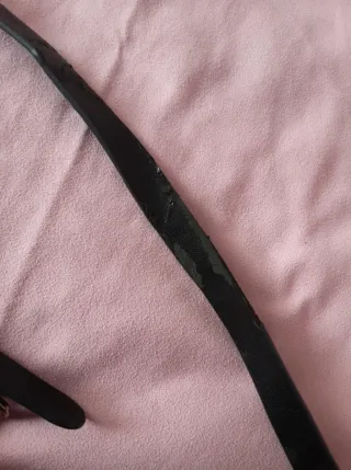 Bolso Parfois negro con cadena y flecos