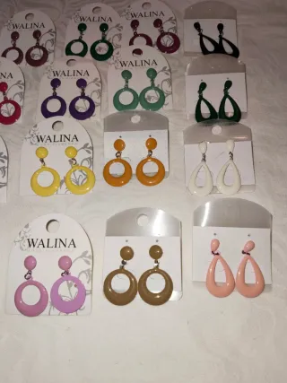 Pendientes estilo Nancy Ho similar metal