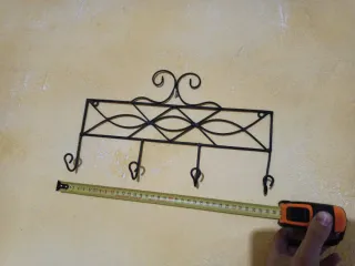 Perchero de pared metálico negro