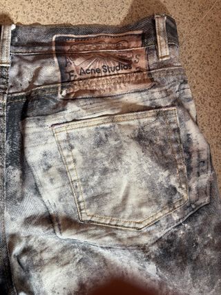 Pantalones Acne Studios grises y negros