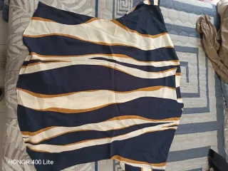 Blusa con estampado de rayas onduladas