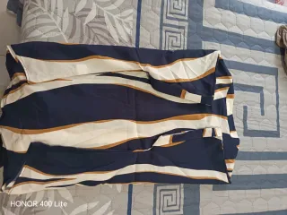 Blusa con estampado de rayas onduladas