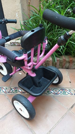 Triciclo rosa evolutivo con asa