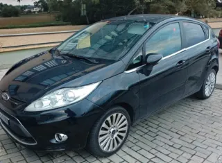 Ford Fiesta Titanium 2008 cambio por moto 3 ruedas