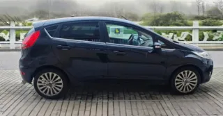 Ford Fiesta Titanium 2008 cambio por moto 3 ruedas