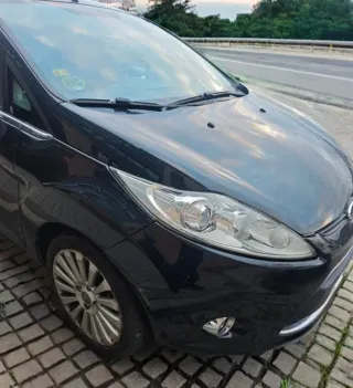 Ford Fiesta Titanium 2008 cambio por moto 3 ruedas