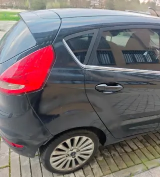 Ford Fiesta Titanium 2008 cambio por moto 3 ruedas