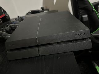 PS4 (PlayStation 4) Negra con juegos