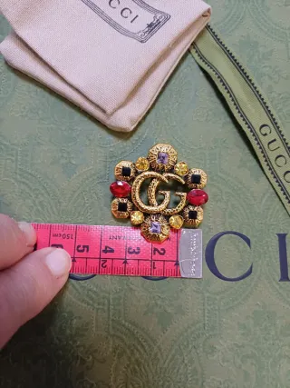 Spilla vintage Gucci GG con cristalli