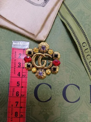 Spilla vintage Gucci GG con cristalli