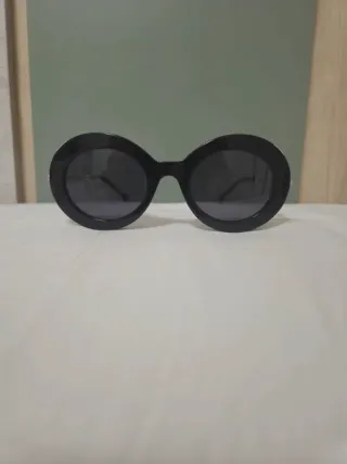 Gafas de sol Carolina Herrera doradas y negras