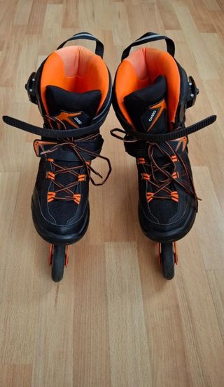 Patines e Oxelo negros y naranjas Talla 45