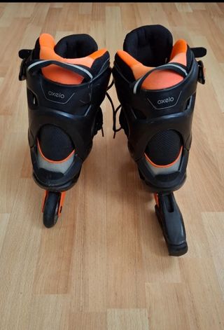 Patines e Oxelo negros y naranjas Talla 45