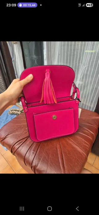 Borsa a tracolla fucsia con nappina